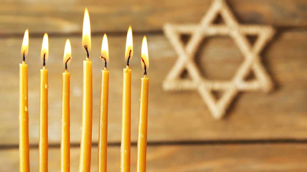 A photo of a menorah and the star of david