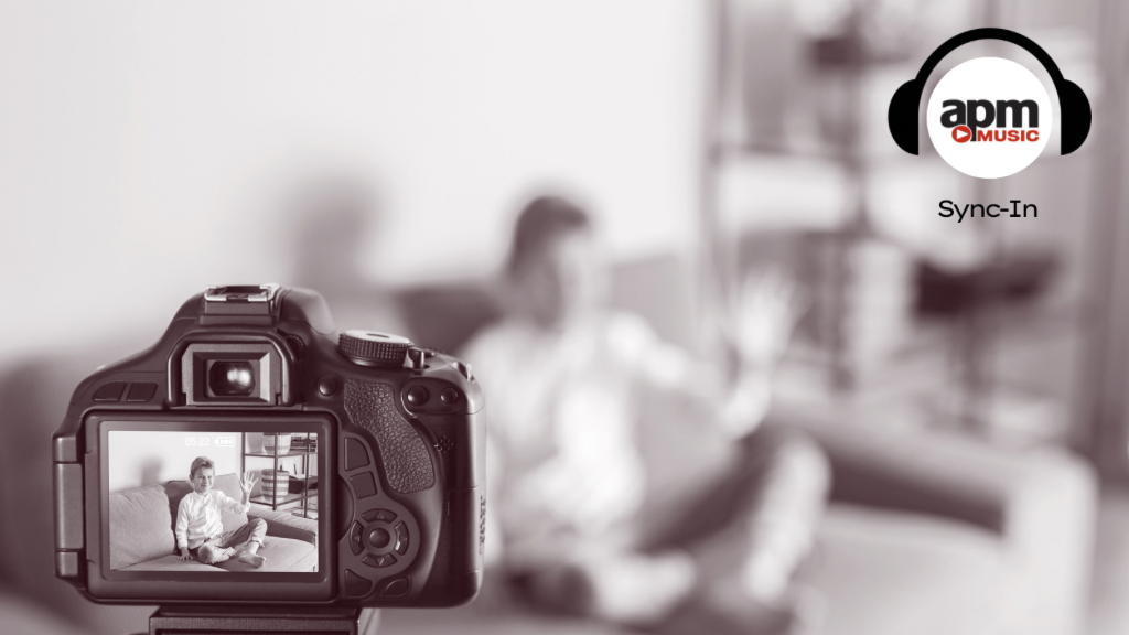 A photo of a child being filmed on a digital camera